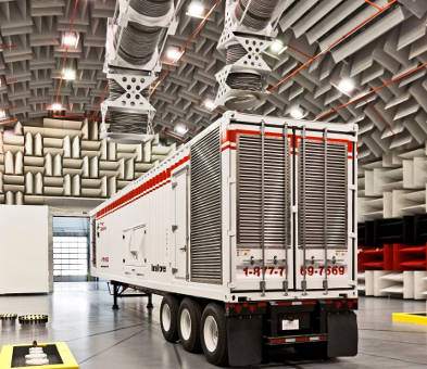 red and white truck in semi-anechoic chamber with metal wedges