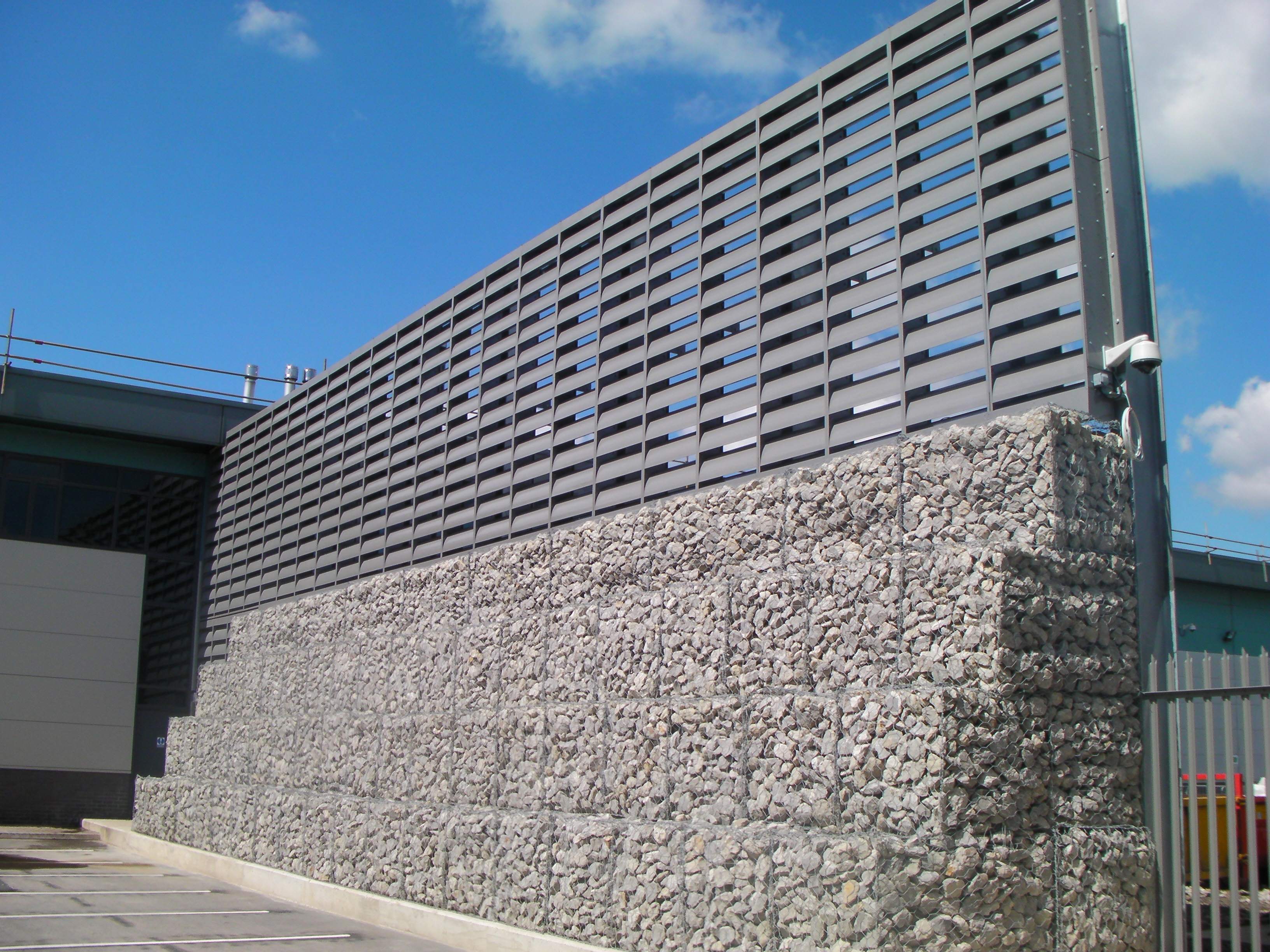 Noise barriers for industrial plants and machines