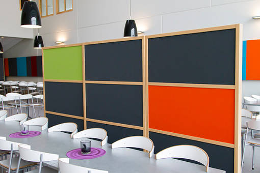 Noise screen in several colours placed in canteen